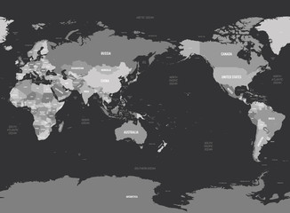 World map - Asia, Australia and Pacific Ocean centered. Grey colored on dark background. High detailed political map of World with country, capital, ocean and sea names labeling