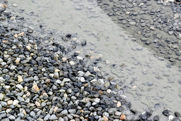 Ground with stones