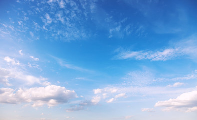 Naklejka na ściany i meble Beautiful blue sky with delicate clouds Sky background.