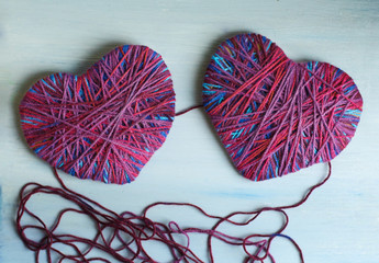 happy Valentines day still life card with woolen yarn thread heart , ball of thread and copy space...