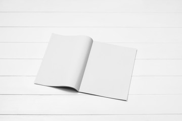 Mock-up magazine, newspaper or catalog on white background. Blank page