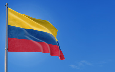 Colombia flag waving in the wind against deep blue sky. National theme, international concept. Copy space for text.