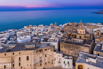 Aerial view, from the old town of Monopoli, at dusk, Puglia, Italy,