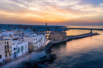 Naklejka premium Aerial view, from the old town of Monopoli, at dusk, Puglia, Italy,