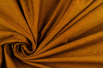 Texture of brown fabric close up.  Plexus threads.
