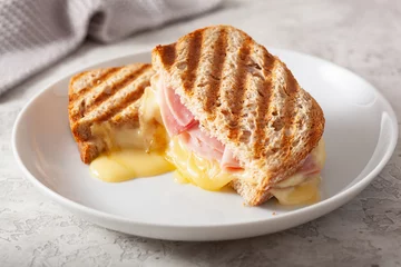 Foto op Canvas grilled ham and cheese sandwich © Olga Miltsova