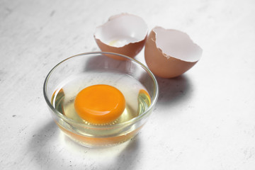 Group of of raw chicken eggs on rustic background, Ingredient for Scrambled eggs in loft style kitchen