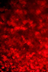 Abstract light, red bokeh pattern in heart shape. St Valentines Day or Holiday concept, background image.
