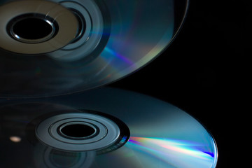 compact-discs on a black background