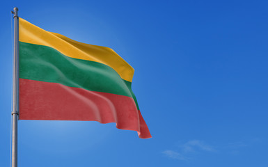 Lithuania flag waving in the wind against deep blue sky. National theme, international concept. Copy space for text.