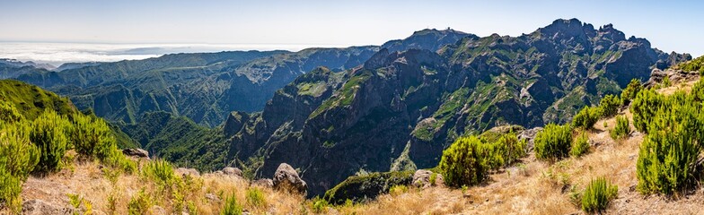Fototapeta na wymiar Panoramic picture over the rough Portugese island of Madeira in summer