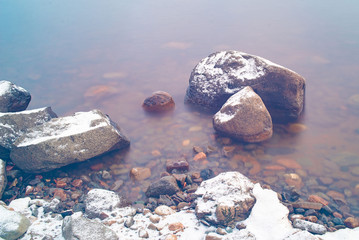 Snow stones on the beach