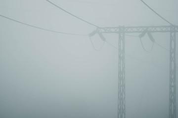Close shots electricity tower details. Foggy weather 