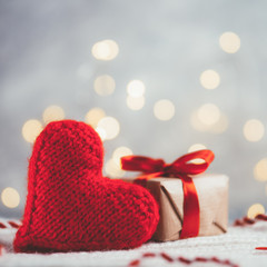 Red soft heart and gift box. Valentine's day greeting card