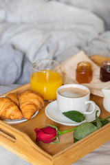 Breakfast on the bed. Good morning concept.