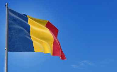 Romania flag waving in the wind against deep blue sky. National theme, international concept. Copy space for text.