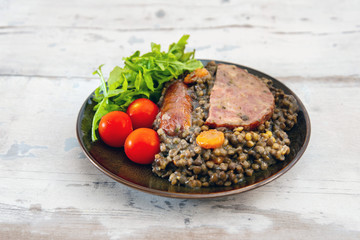 Green lentils with smoked pork sausage smoked choice, carrots and onions