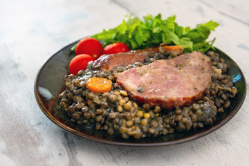 Green lentils with smoked pork sausage smoked choice, carrots and onions