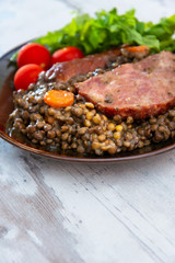 Green lentils with smoked pork sausage smoked choice, carrots and onions