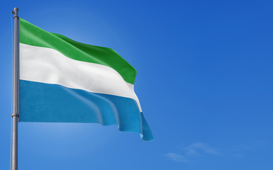 Sierra Leone flag waving in the wind against deep blue sky. National theme, international concept....