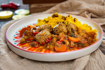 Kofta Tagine Moroccan Meatballs Served With Semolina and Vegetables