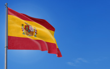 Spain flag waving in the wind against deep blue sky. National theme, international concept. Copy space for text.