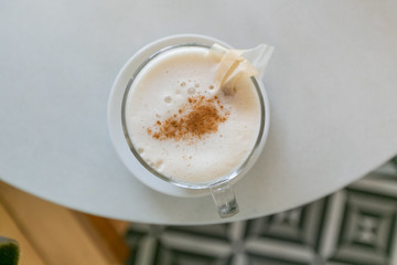 London fog latte in trendy coffee shop with modern tile floors