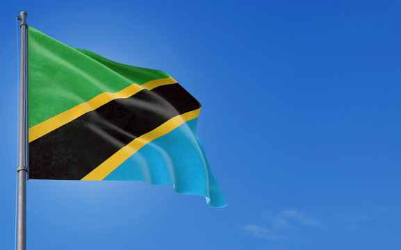 Togo flag waving in the wind against deep blue sky. National theme,  international concept. Copy space for text. Stock Photo