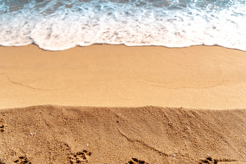 Minimal composition of sand and sea water. Aerial view. Copy space. Background for summer travel