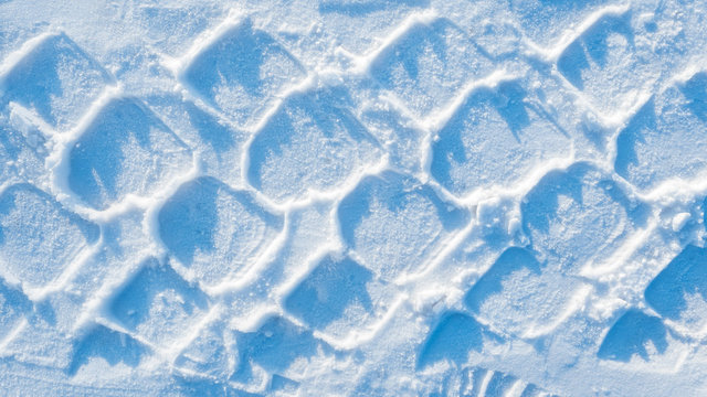 car tire tracks in the snow, winter background