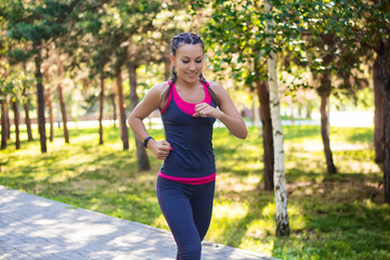 sporty woman doing jogging in the park