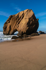 Praia de Santa Cruz beach rock boulder, in Torres Vedras, Portugal