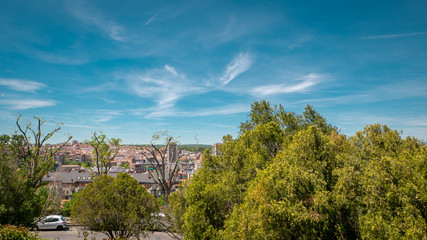 Fototapeta na wymiar Panoramic view of the downtown Madrid from the famous park Las Vistillas in Spain on a sunny day during the traditional festival in May called San Isidro in the capital of Spain
