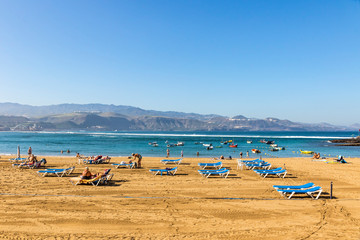 Las Canteras Beach (Playa de Las Canteras) in Las Palmas de Gran Canaria city, Canary island, Spain. Long beach with natural barrier reef in 200 metres from the shore, which protects it from the tides © katatonia