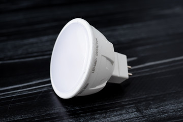 White led lamp on black background. A small diode lamp, gu 5.3.