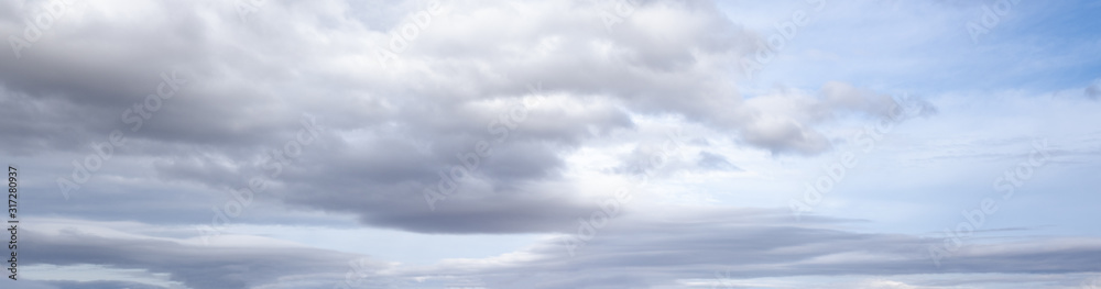 Wall mural overcast sky background with clouds