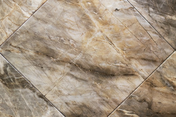 Background of brown-gray marble slabs
