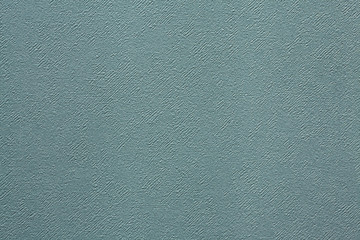 Gray embossed wall: background with gray textured surface, concept with copy-space