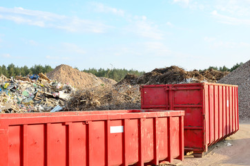 Skip for dumping renovation waste. Metal tanks and capacities for storage and transportation of garbage. Metal trash cans and containers for MSW.