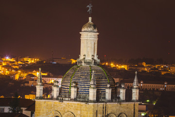 Fototapeta na wymiar view through a church on an ancient european town at night
