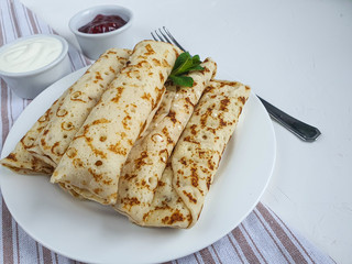 Pancakes with homemade cottage cheese. Sour-milk fermented product. Healthy, delicious breakfasts. With sour cream and raspberry jam.