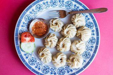 Flat lay of Nepalese momo dumplings with yak meat