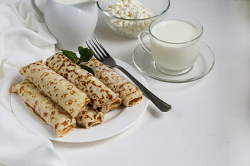 Pancakes with homemade cottage cheese. Sour-milk fermented product. Healthy, delicious breakfasts. With sour cream and raspberry jam.