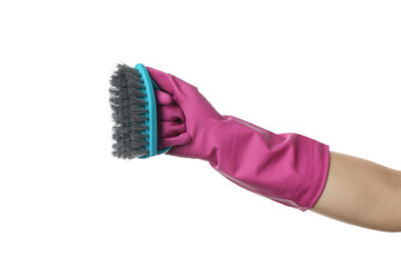 Hand in cleaning glove hold brush, isolated on white background
