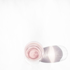 raw pink coconut water in glass