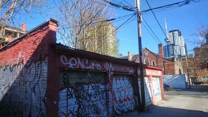 View of the CN Tower from a back-alley in Toronto 