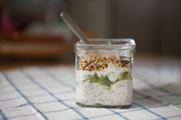 Yogurt and muesli in glass jar