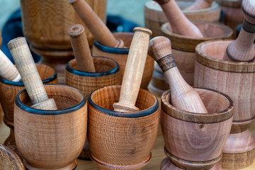 Wooden mortar and pestle for sell in local street market in Tbilisi