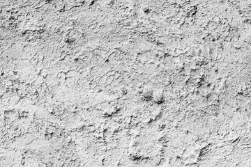 Texture of a concrete wall with cracks and scratches which can be used as a background