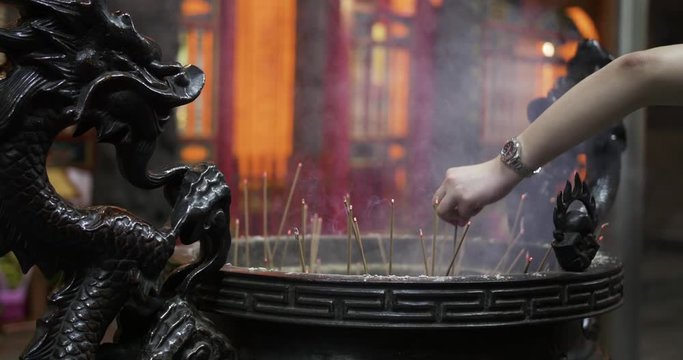 A traditional chinese incense burner in an old temple in Taiwan, Republic of China. Longshan Temple, Taipei City.  Happy Chinese new year!
